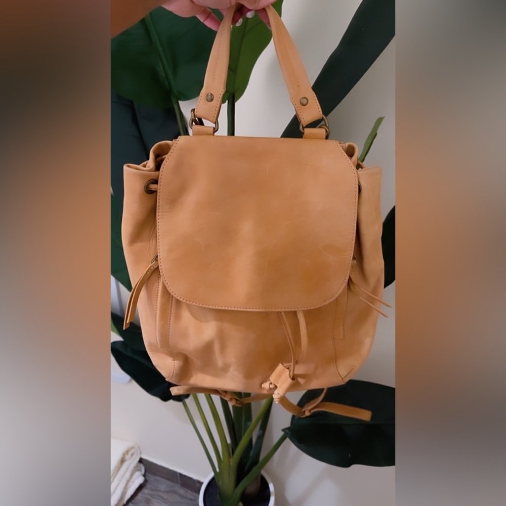 Tan/brown backpack.